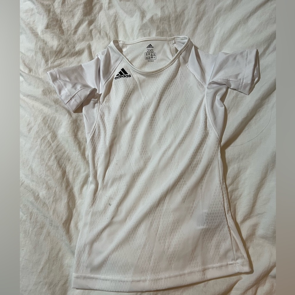 Adidas White workout top with shoulder cut outs.